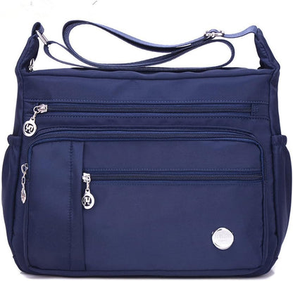 Alida - Multi-pocket shoulder bag with anti-theft device-Elly Rose
