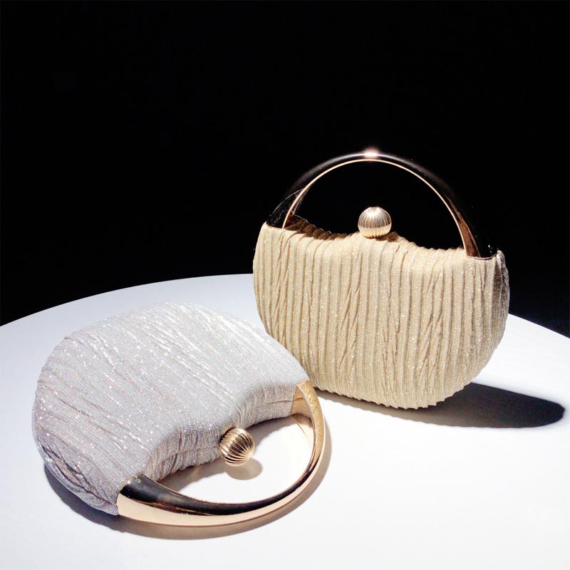 Chic clutch bag with metal handle - Leighton-Elly Rose