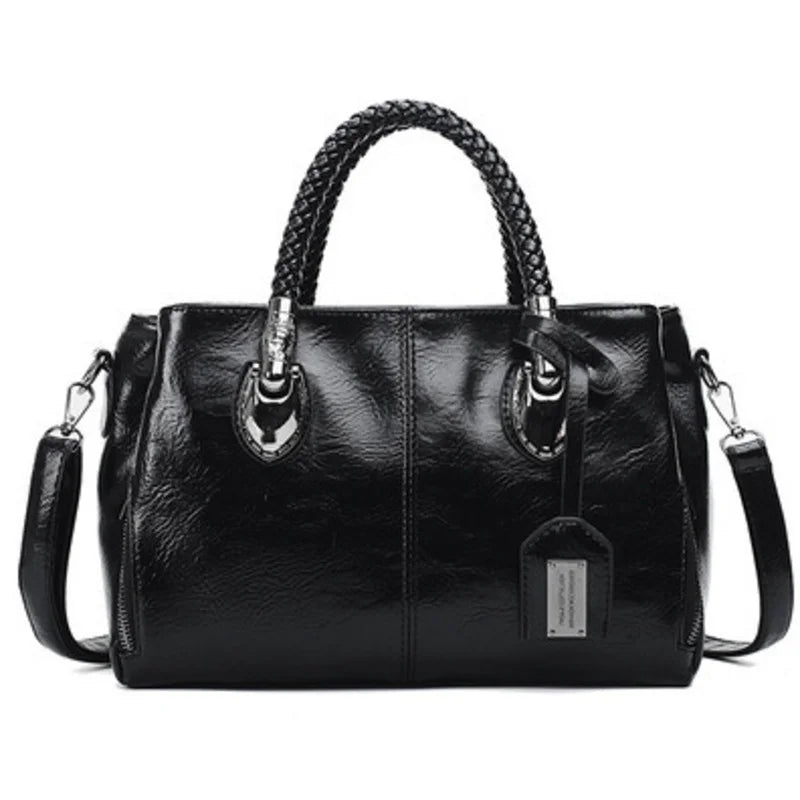 Pia | "Elegant leather handbag with braided handle".-Elly Rose