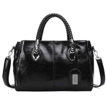 Pia | "Elegant leather handbag with braided handle".-Elly Rose