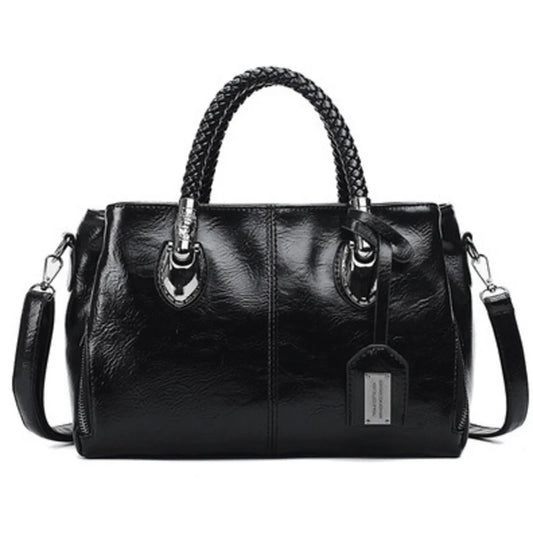 Pia | "Elegant leather handbag with braided handle".-Elly Rose