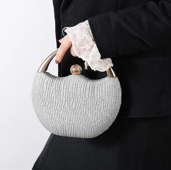 Chic clutch bag with metal handle - Leighton-Elly Rose
