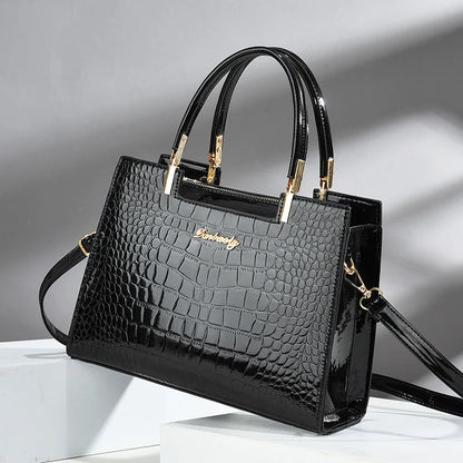 Wilja | Shiny leather handbag with crocodile pattern-Elly Rose